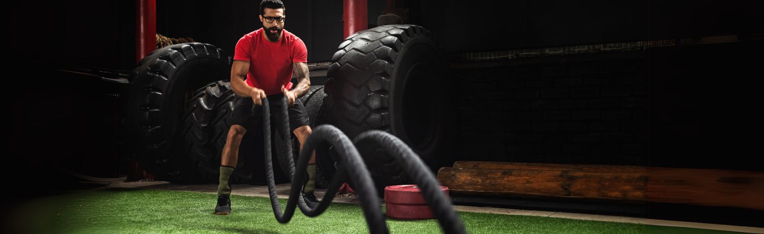 Man Doing Full Body Exercises with Battle Rope in the Gym | HustlersOnlyUK